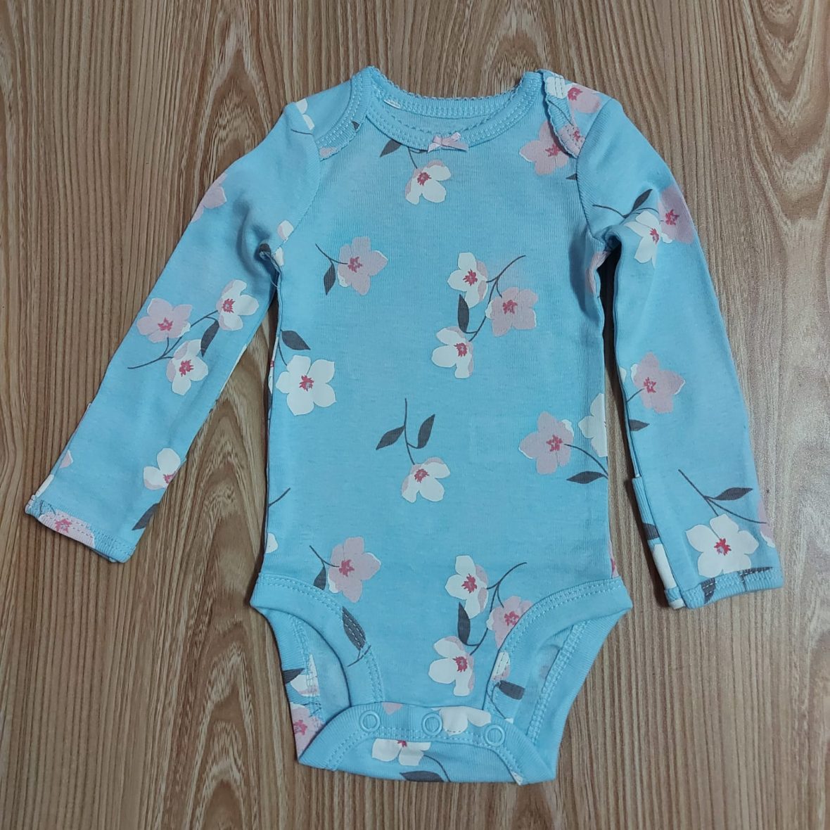 Carter’s Baby Girl Long Sleeve Onesie – Blue/Floral