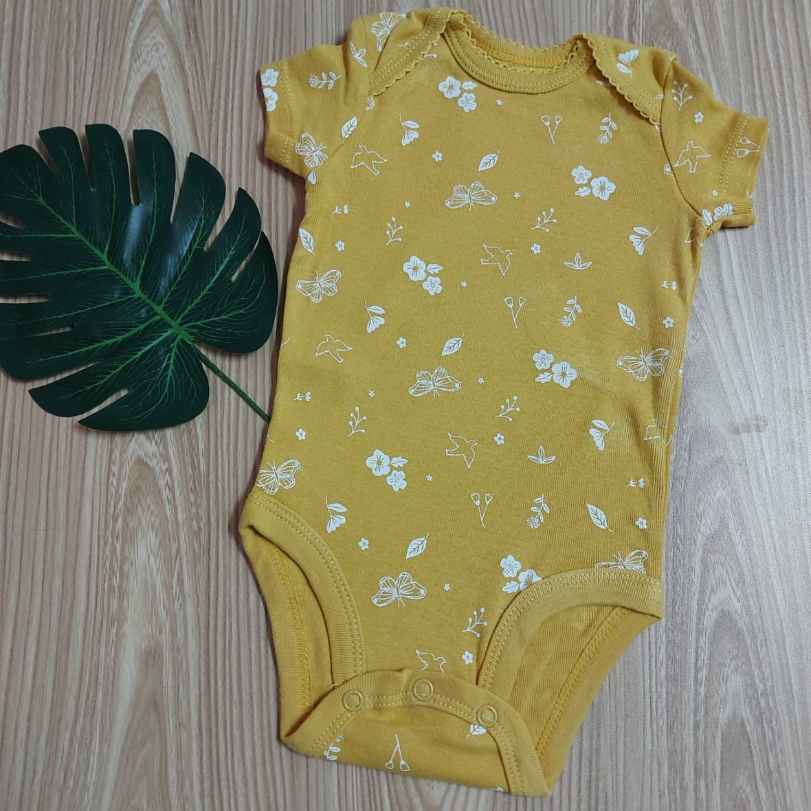 Carter’s Baby Girl Short Sleeve Onesie – Mustard Yellow/Floral